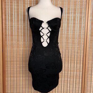 Black floral body on mini dress with lace up and silver ring details